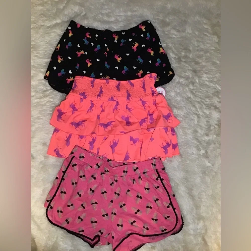 Justice 3 sets of shorts sizes (shorts 18/20) (skirt 14/16)